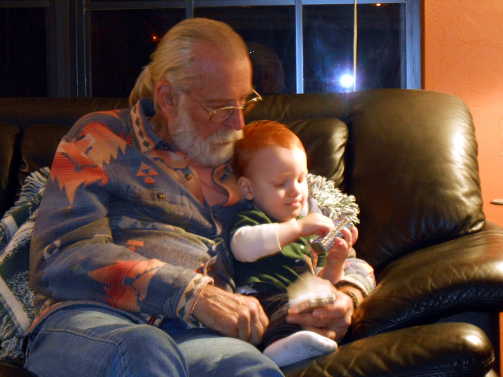Opening presents with grandpa.